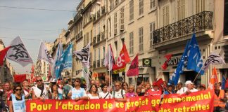 French workers marching in Marseilles demand the government abandon their policiy to increase the pensionable age