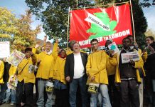 Marchers with busworkers Unite union official John Hughes just before the march began on October 30 in Manchester