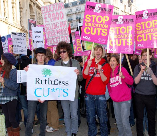 The demonstration was a sea of anti-fees and anti-cuts placards and banners as students filled Whitehall on Wednesday