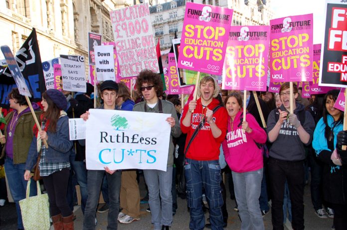 The demonstration was a sea of anti-fees and anti-cuts placards and banners as students filled Whitehall on Wednesday