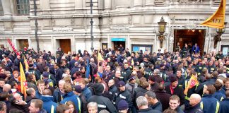 Firefighters gather outside the Central Hall, Westminster after their rally to begin lobbying their MPs