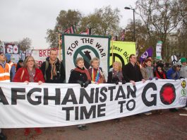 PULL THE TROOPS OUT NOW! – say anti war marchers Ex -soldier JOE GLENTON (3rd from left) at the front of Saturday’s march against the war on Afghanistan