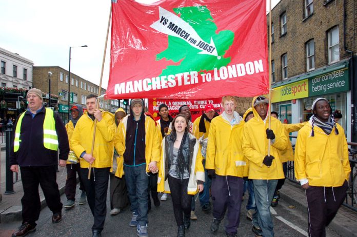 YS March for Jobs contingent led Sunday’s march to the News Line Anniversary Rally in Queen Mary University in Mile End