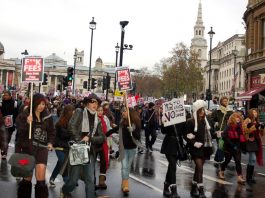 STUDENT UPRISING AGAINST FEES –rocks the Tory-LibDem coalition Students take their protest down Whitehall before the march began