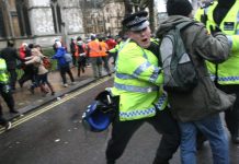 Police attack youth trying to march to Parliament to protest about the plan to raise tuition fees to £9,000 a year – Photo by Gareth Jukes