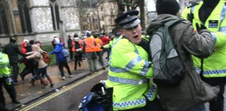 Police attack youth trying to march to Parliament to protest about the plan to raise tuition fees to £9,000 a year – Photo by Gareth Jukes