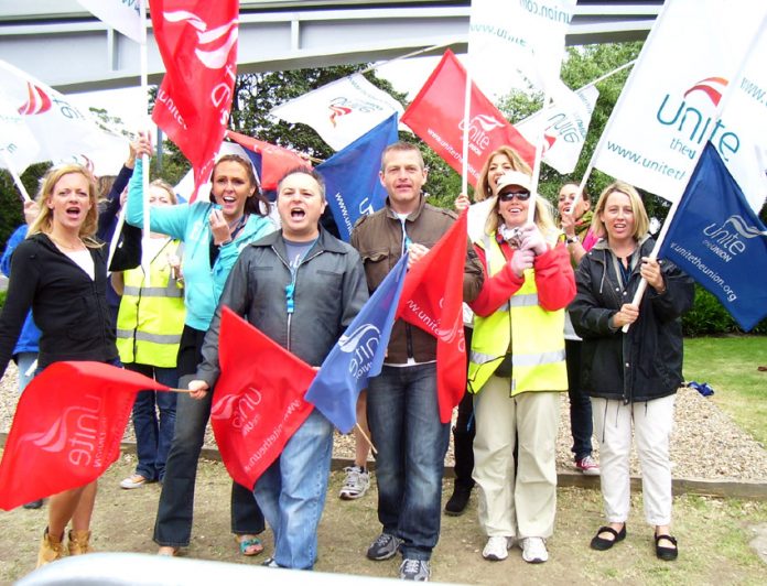 Workers demonstrate at Heathrow during strike action by the cabin crew earlier this year. A new strike ballot is under way
