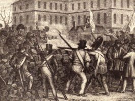 Defending the street barricades in 1848 (From a contemporary print)