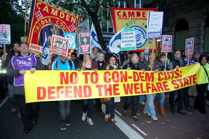Trade union banners on a demonstration on October 20, the day the coalition’s Comprehensive Spending Review  was announced