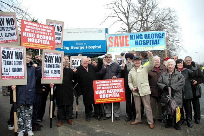 Residents rally outside King George Hospital just before their march to defend it last year