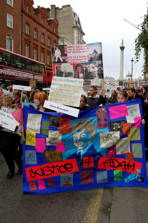 Adam’s mother (holding banner on left) during a United Families and Friends march to Downing Street