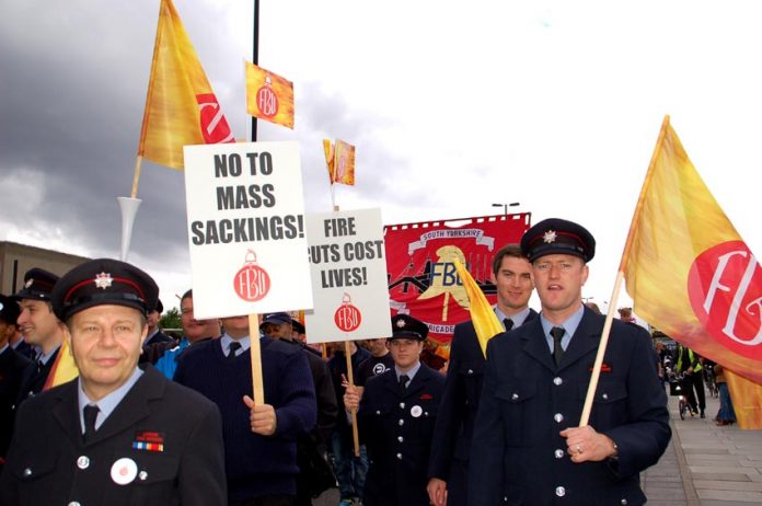 London firefighters marching in September last year in defence of their jobs