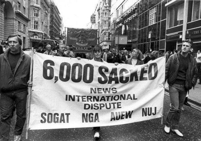 Sacked print workers marched down Fleet Street showing their determination not to be beaten by Murdoch