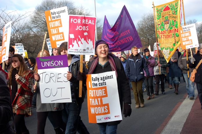 Students on Saturday’s demonstration in Manchester against cuts and tuition fees demand that the government be brought down