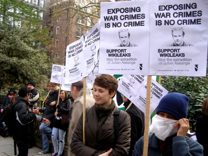 Part of the demonstration when Julian Assange appeared in court in December last year