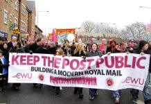 Thousands of postal workers and their families marched through Kingston in January to demand ‘Keep the Post Public’