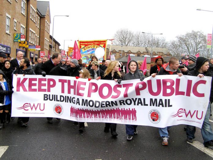 Thousands of postal workers and their families marched through Kingston in January to demand ‘Keep the Post Public’