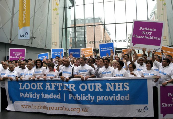 Doctors demonstrate their opposition to the privatisation of the National Health Service at their Annual Representative Meeting of the BMA
