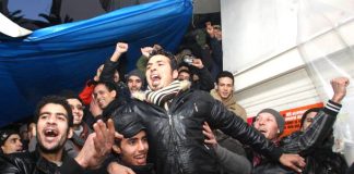 Greek migrant workers celebrate their right of temporary stay and no deportations