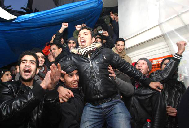 Greek migrant workers celebrate their right of temporary stay and no deportations