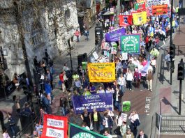 Union banners from Sheffield, Derby, London and other towns and cities as workers converge on London last April, warning of devastating attacks on public services