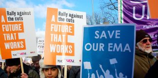 Placards held aloft on the NUS/TUC march in Manchester in January