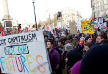 A section of the 100,000-strong march against £9,000 tuition fees passing by Trafalgar Square on December 9 last year