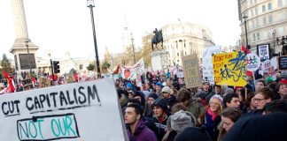 A section of the 100,000-strong march against £9,000 tuition fees passing by Trafalgar Square on December 9 last year