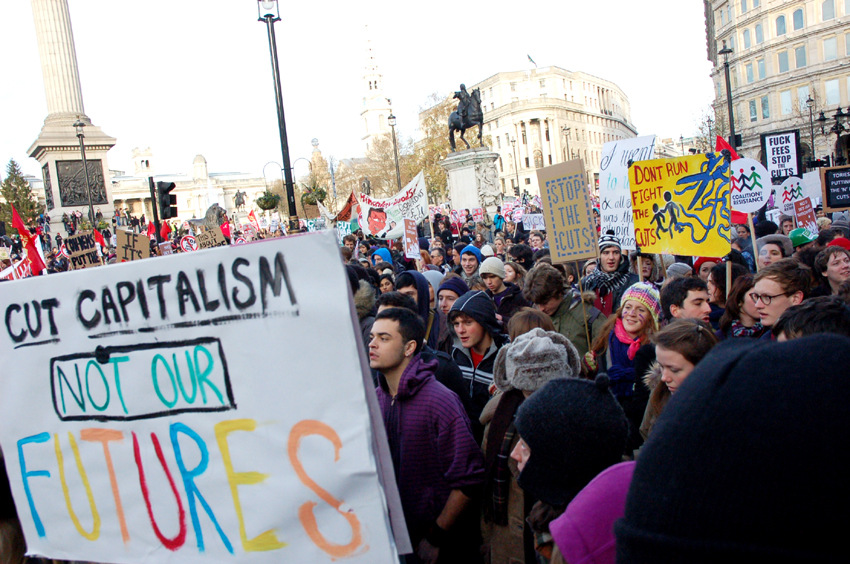 A section of the 100,000-strong march against £9,000 tuition fees passing by Trafalgar Square on December 9 last year