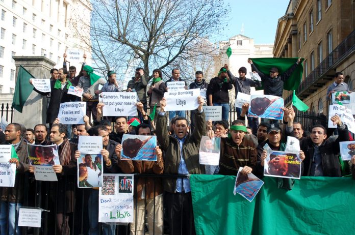 ‘We all support Colonel Gadaffi’ demonstrating Libyan students insisted outside Downing Street yesterday