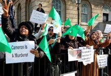 Libyan demonstrators at 10 Downing Street on Monday indict Cameron and imperialism and declare their support for Colonel Gadaffi