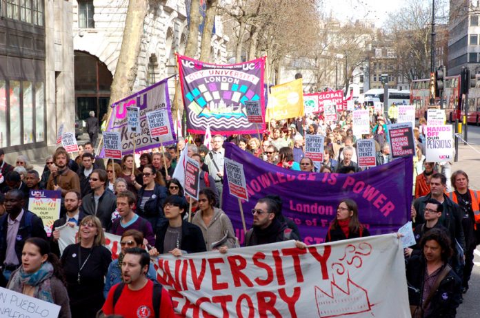 Yesterday’s march by lecturers and students heads towards Whitehall from the London School of Economics