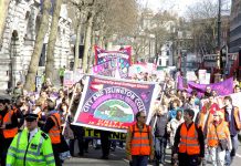 Striking lecturers marching on Thursday in London as part of their national strike action in defence of pensions and in opposition to wage cuts