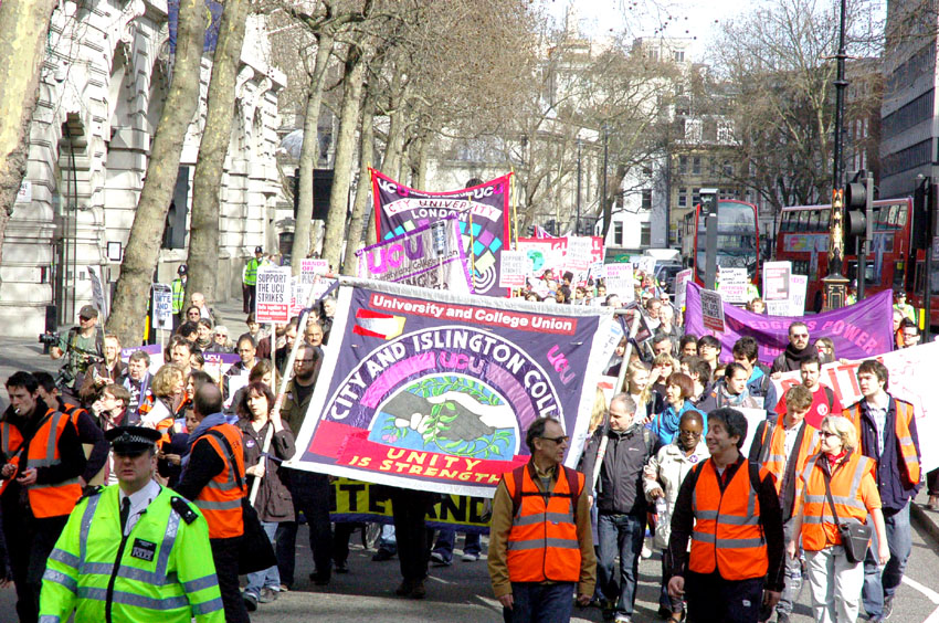 Striking lecturers marching on Thursday in London as part of their national strike action in defence of pensions and in opposition to wage cuts