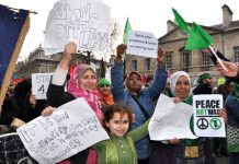 Women and children demonstrate their opposition to the bombing of Libya at the recent massive TUC anti-cuts march