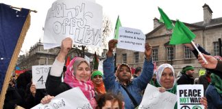 Women and children demonstrate their opposition to the bombing of Libya at the recent massive TUC anti-cuts march