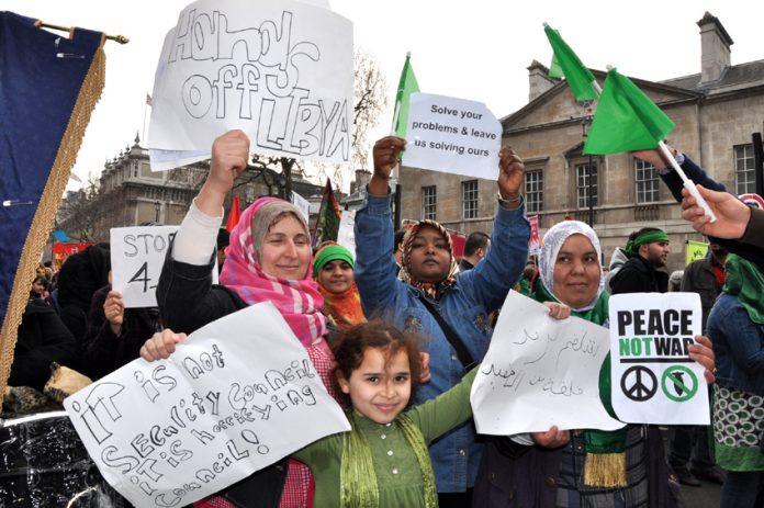 Women and children demonstrate their opposition to the bombing of Libya at the recent massive TUC anti-cuts march