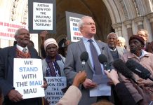 The four Kenyan claimants with lawyer Martin Day outside the High Court before the start of yesterday’s hearing