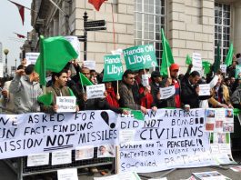 Banners on the mass picket of the Contact Group’s first meeting in London last month exposing the lies of the imperialists about the war they have launched against Libya