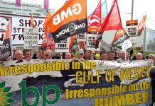 Locked-out Hull construction workers joined environmentalists outside the BP shareholders AGM in Docklands yesterday