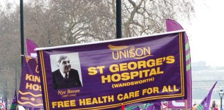 Trade union banners and placards demanding defence of the NHS and no cuts – these will be key demands on May Day