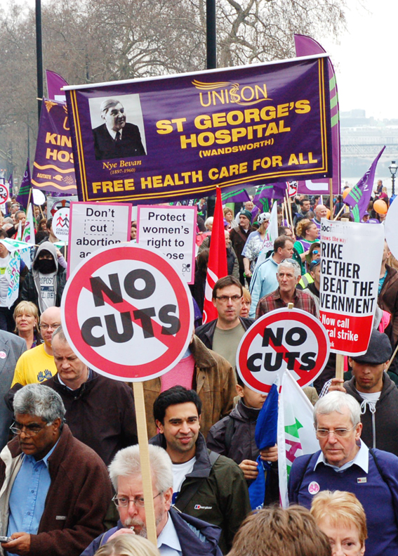 Trade union banners and placards demanding defence of the NHS and no cuts – these will be key demands on May Day