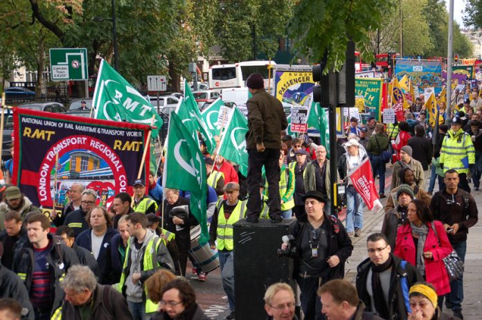 RMT and TSSA rail unions led a march against cuts announced in the coalition’s Comprehensive Spending Review last October