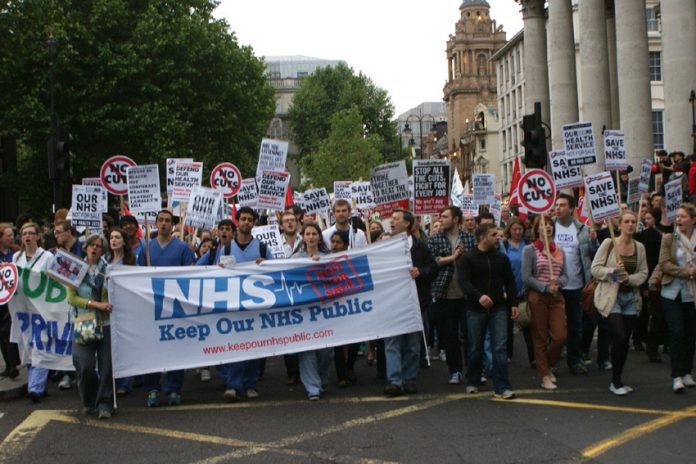 Over 5,000 health workers and other trade unionists marched to the Department of Health on Tuesday, demanding withdrawal of the government’s Health and Social Care Bill