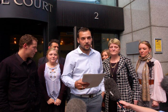 PAUL KING, stepson of Ian Tomlinson, addressing the press outside the office of the Crown Prosecution Service yesterday
