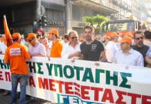 DEH public electricity board workers marching to the Greek parliament square