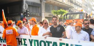 DEH public electricity board workers marching to the Greek parliament square