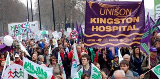 Kingston Hospital Unison banner – the massive increase in TB cases makes the defence of the NHS more urgent than ever
