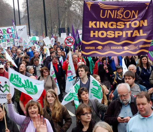 Kingston Hospital Unison banner – the massive increase in TB cases makes the defence of the NHS more urgent than ever