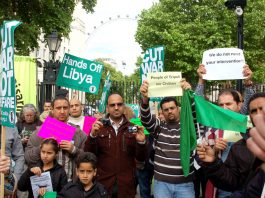 Libyan workers and youth demonstrating in London last month against the NATO-led attack on their country